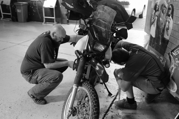 Working on the DR650 in Arusha